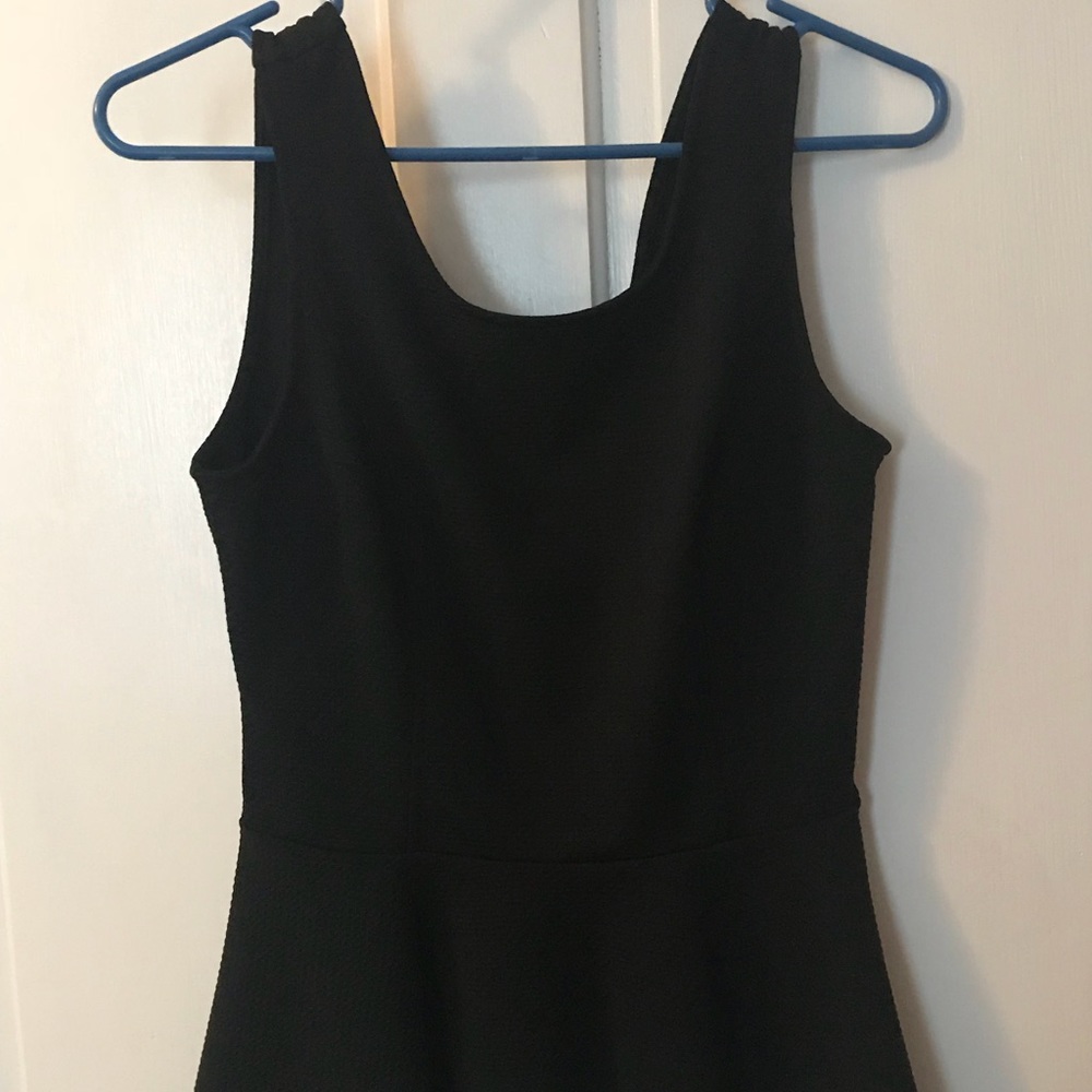Black peplum tank
